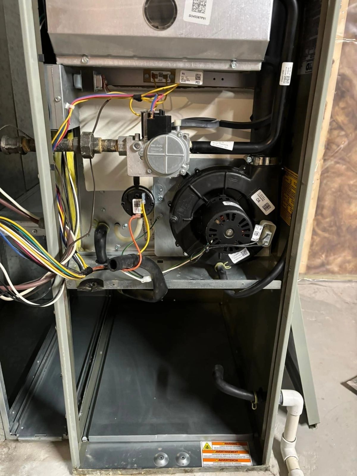 Open furnace cabinet during an Aurora cleaning and inspection
